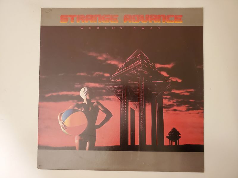 Strange Advance Worlds Away vinyl record
